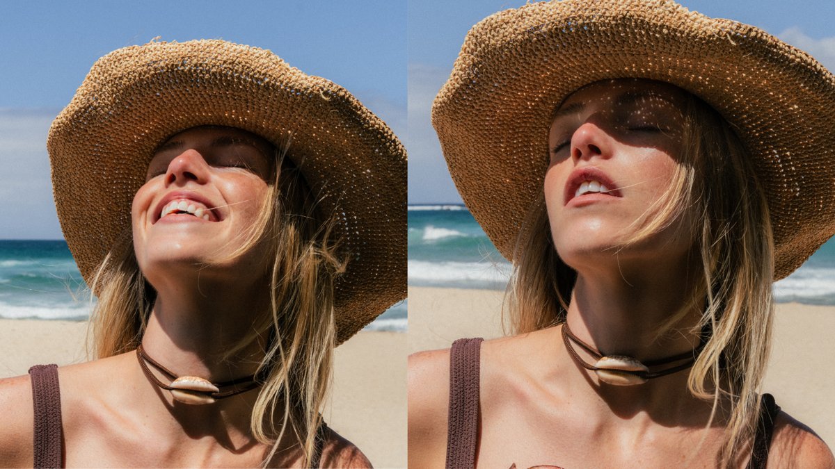Woman wearing a straw hat on a beach with ocean view
